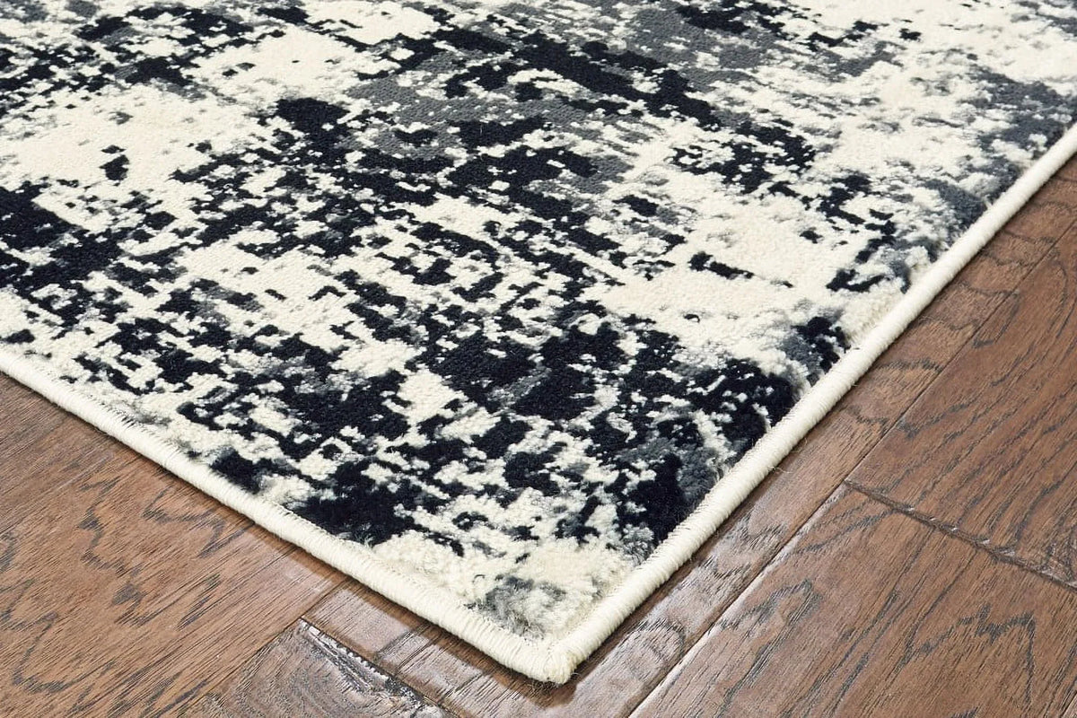 5 x 7 Black and Ivory Abstract Area Rug